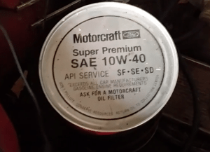 Oil still in can from Ford Motorcraft still unopened